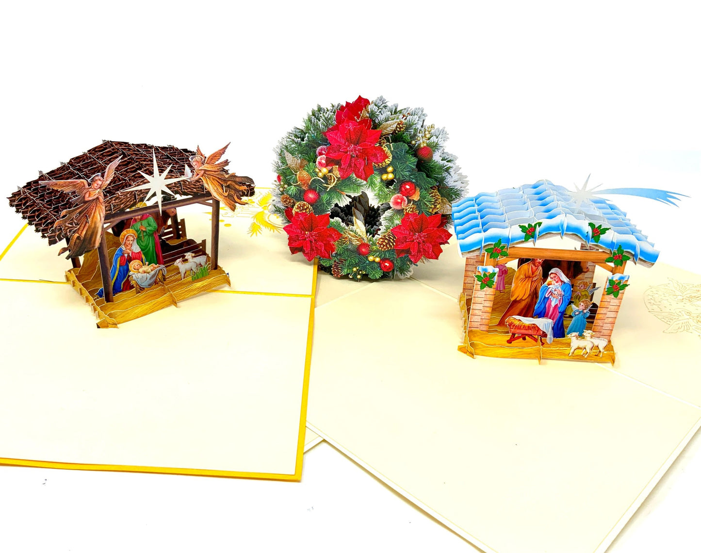 "Holy Triptych: A Festive Card Collection with Two Nativity Scenes and a Wreath, Unveiling the Spirit of Christmas in Every Fold."