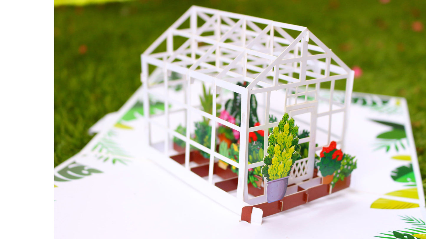 "Greenhouse pop-up card: A three-dimensional card with a charming greenhouse design, focusing on the greenhouse structure and interior, featuring intricate details and lush vegetation."