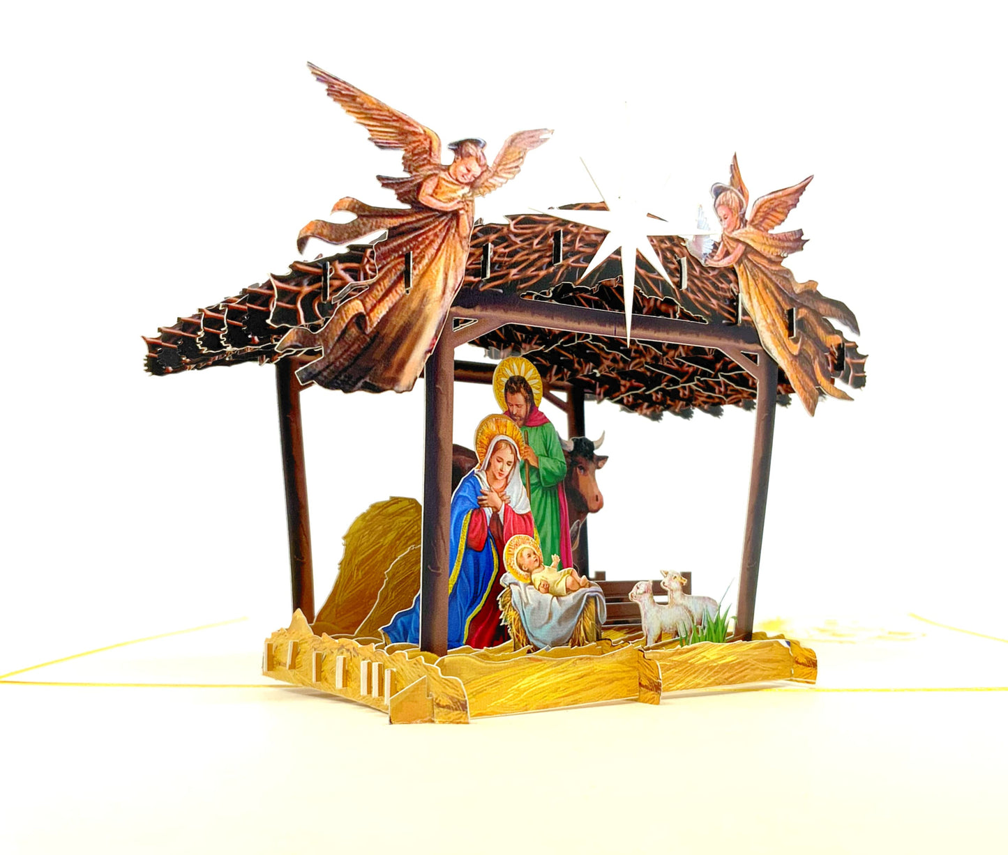 "Nativity scene pop-up card: A three-dimensional card with an intricately crafted pop-up of a nativity scene, perfect for celebrating the Christmas season and conveying the story of the birth of Jesus."