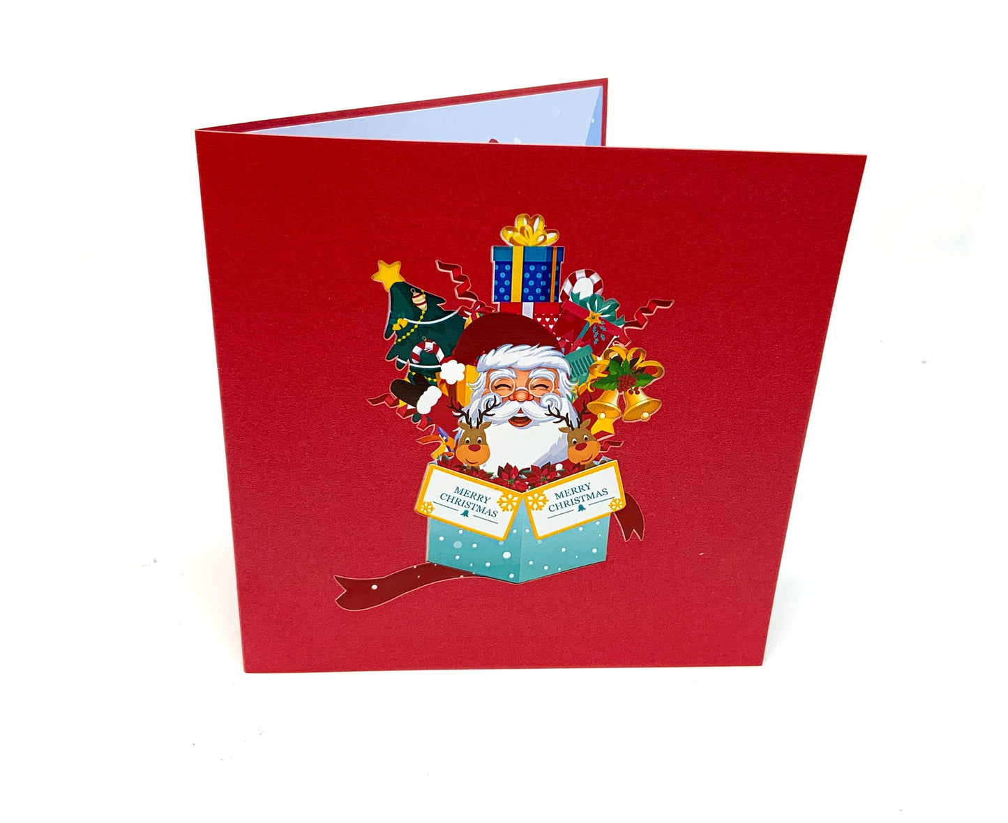 &quot;Front cover of the Santa in a Box pop-up card: The cover features an inviting and festive design with an image that hints at the intricate pop-up scene featuring Santa Claus inside, perfect for adding holiday cheer to various occasions.&quot;