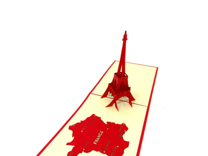 &quot;An Eiffel Tower pop-up card: A three-dimensional paper card featuring an intricately crafted pop-up of the iconic Eiffel Tower in Paris, France, with fine details and vibrant red