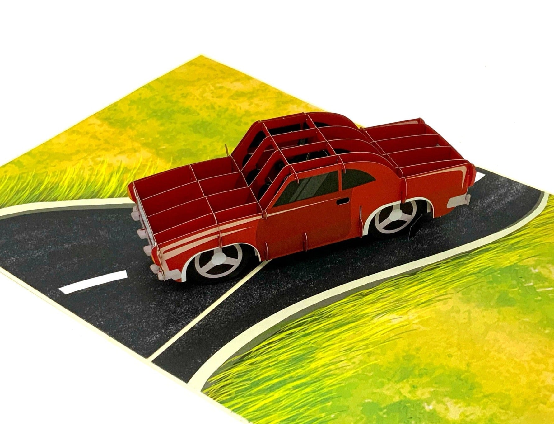 Car 3D pop-up card: A creatively crafted greeting card with a three-dimensional automobile design, offering a fun and unique visual experience.&quot;